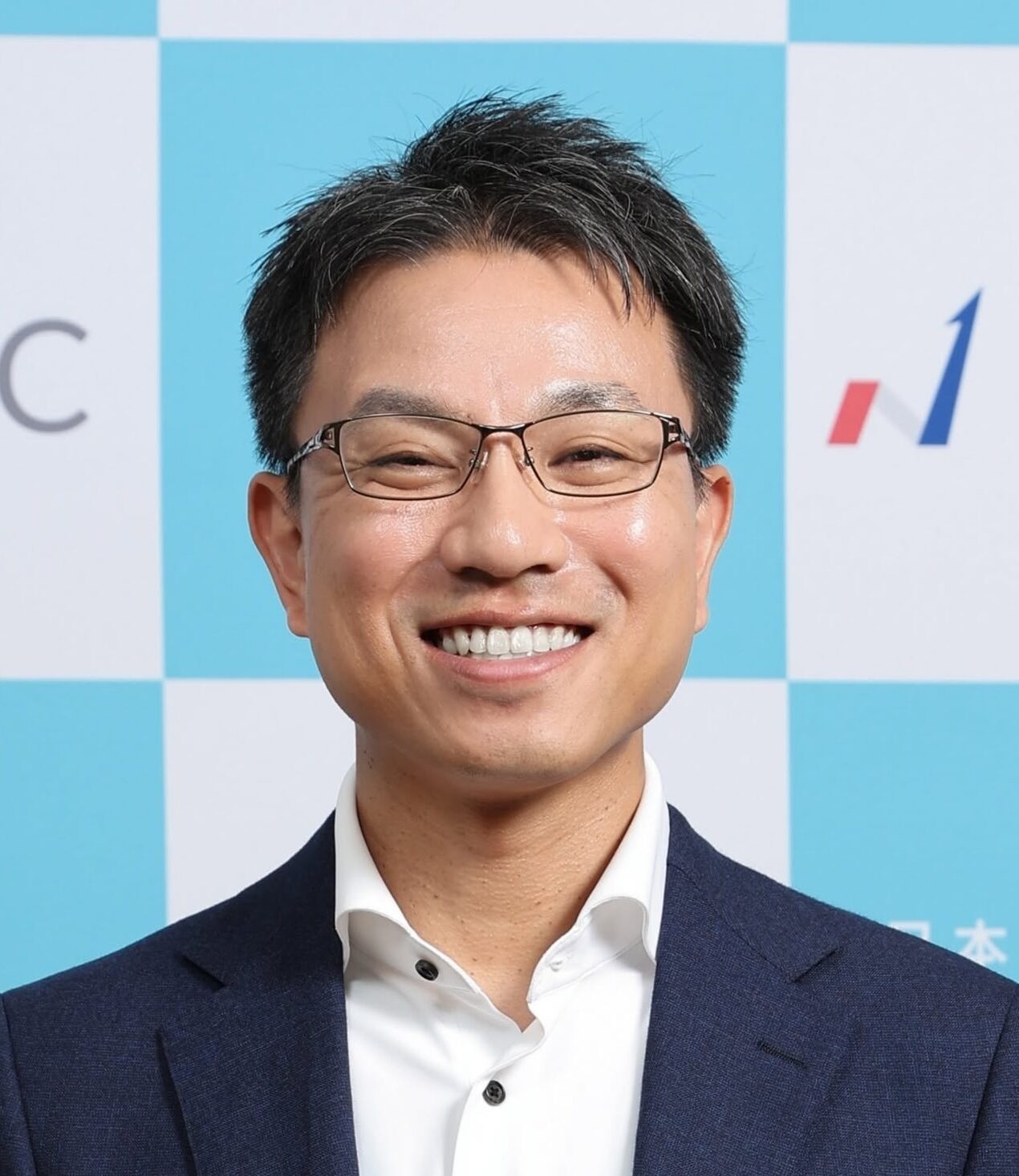 執行役員・導入支援グループマネージャー・石黒　充顕 様